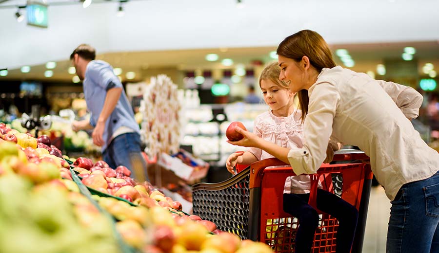 Mother and child grocery shopping in Countdown at Bayfair Shopping Centre